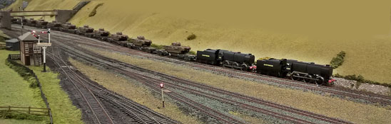 Engines C21 anad C24 on train carrying tanks at Chinley